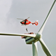 Illustration for article titled Helicopters Used to Fix Giant Wind Turbines